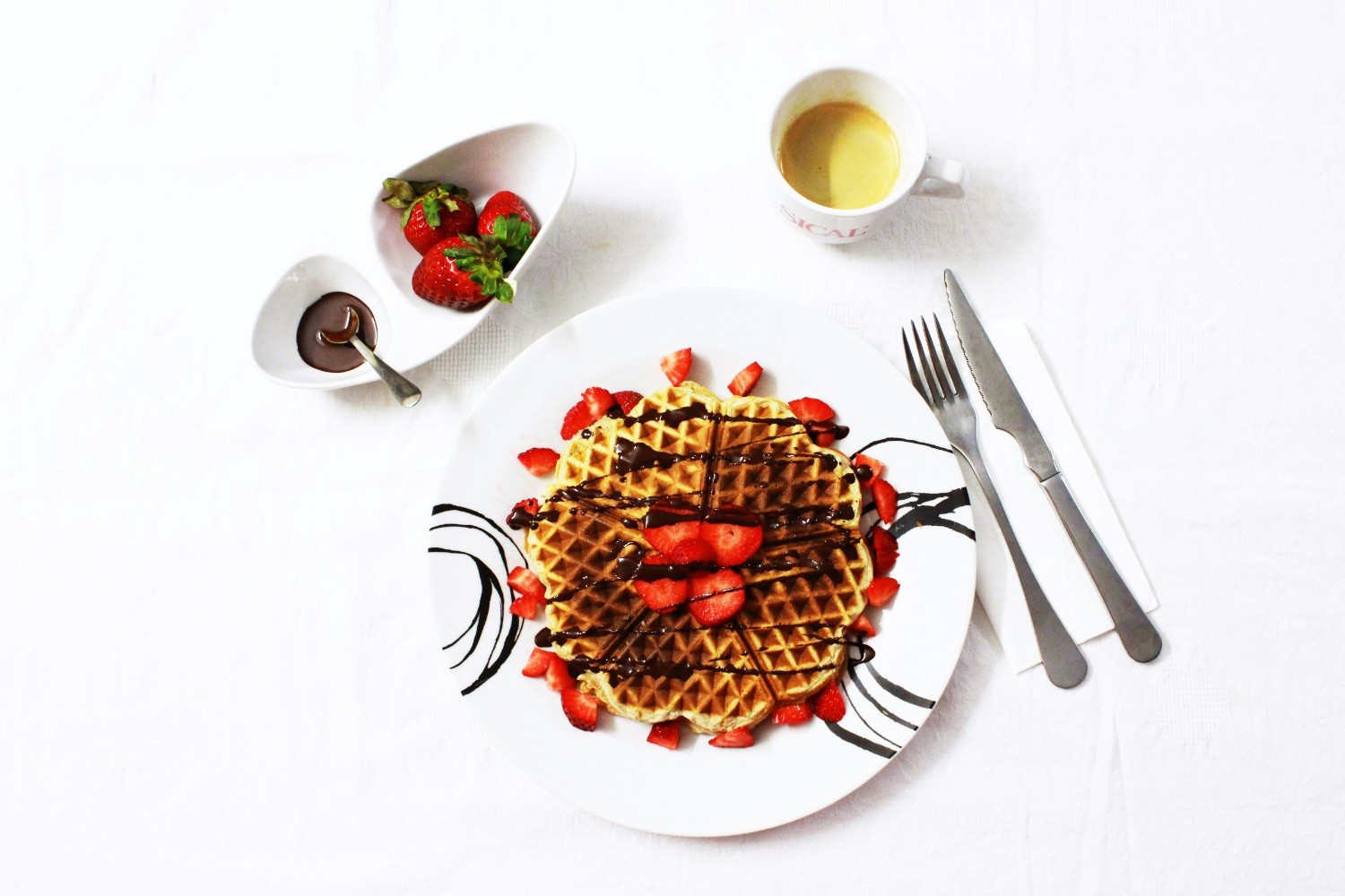 Golden waffle with cream and berries